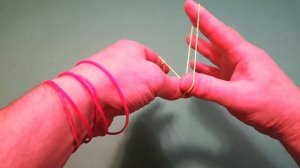 Узелок бегает и прыгает по резинке фокус магия Lace up running jumping around elastic band trick