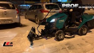 Уборка снега садовым трактором Caiman Rapido 92 с отвалом для снега!.mp4