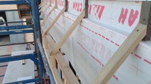 Утеплил и обшил задний фронтон крыши, изготовил козырек.
