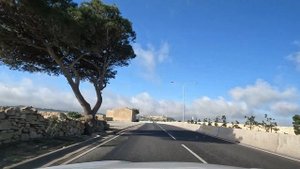Driving Malta: Marsaxlokk - Popeye Village - 4k scenic drive Malta
