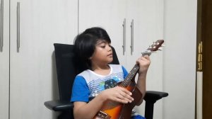 Wrap me in plastic ukulele cover by a 10-year old kid.