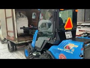 Разгрузка биг бэгов весом 800 кг ( + вес паллетных вил)  мини-погрузчиком с телескопической стрелой