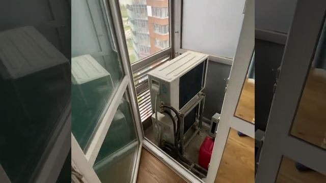 Кондиционер на балконе.