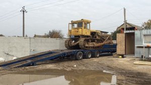 Бульдозер заезжает на трал!