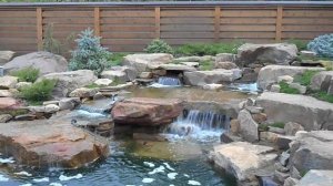 Альпийская горка с водопадом и декоративным прудом