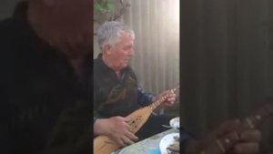 Кумык играет на агъач хомузе