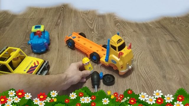 Трактор помогает грузовичку у которого отвалилось колесо.mp4 смотреть онлайн