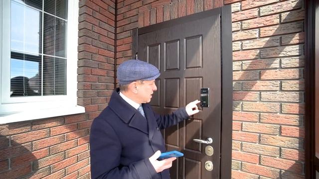 Современный дом с отделкой в американской стилистике в поселке бизнес-класса Ильичевка