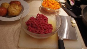 Мясо, тушенное с грибами и картофелем