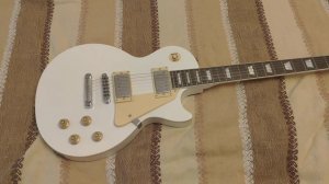 Обзор среднестатистического китайского типа-лес-пола с болченым грифом и не очень красным деревом.