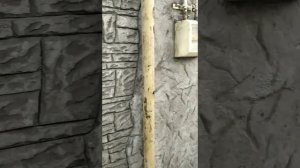 Оформление фасада  штукатуркой под камень