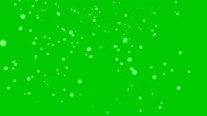падающий снег на зеленом фоне