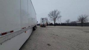 Semi Truck Backing at a Truck Stop