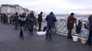 Fishing off a bridge in istanbul, Turkey