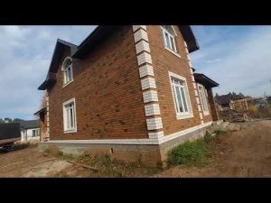 Доработанный дом в верандой и гаражиком