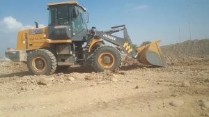 Фронтальный погрузчик Джойстик Xcmg lw300kn в работе