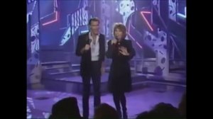 Bill Medley and Jennifer Warnes. The Time Of My Life
