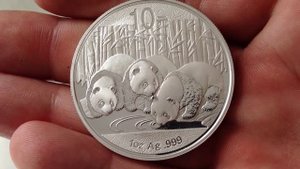 Серебряная инвестиционная монета Китайская Панда 2013 г.в.