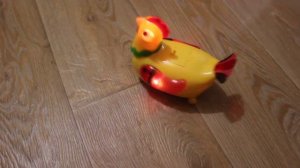 Chicken bears eggs. Layer hen. Игрушка курочка-несушка