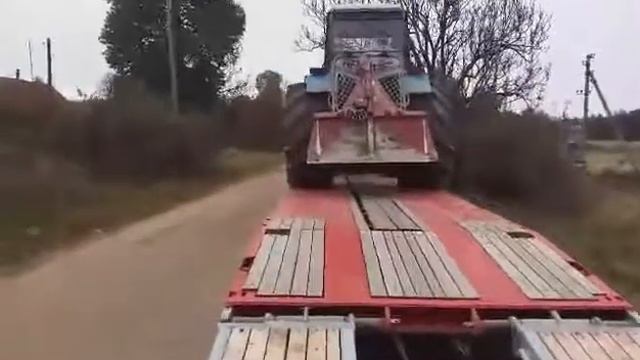 Перевозка тракторов тралом