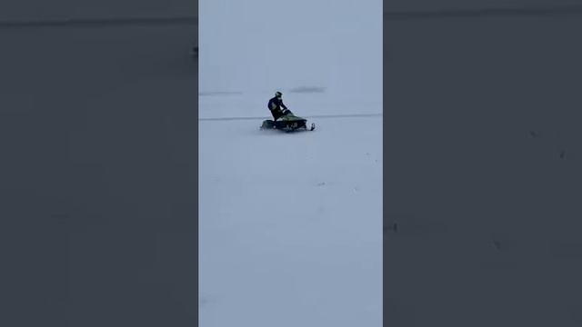 Attempting to sidehill a ditch in a foot of snow on the zr 580