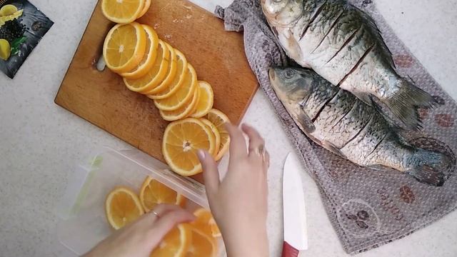 Караси в апельсинах - оригинальный рецепт карасей