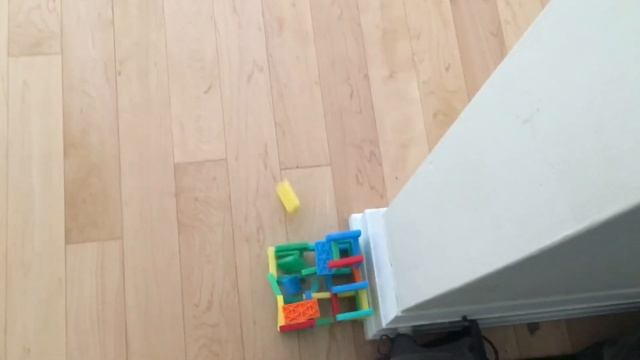 Domino Drops Into A Domino Cube