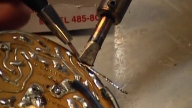 Solder removal using de-soldering braid. смотреть онлайн