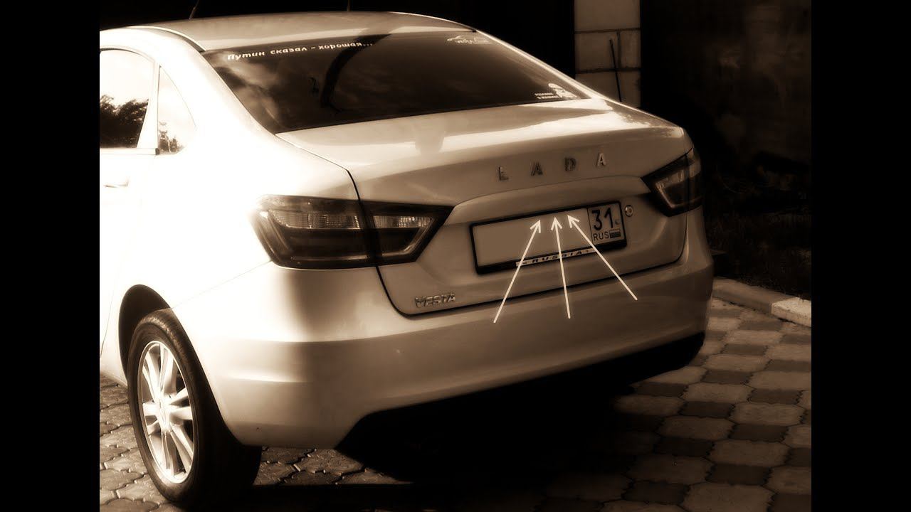 Lada Vesta 1G. Сенсорная кнопка открывания багажника