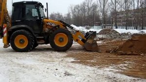 Работа экскаватора-погрузчика  JCB 4CX с фронтальным ковшом