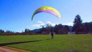 Paragliders practicing on sports fields in Winter