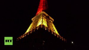 Франция. Эйфелева башня засветилась бельгийским флагом (22.03.2016 г.)