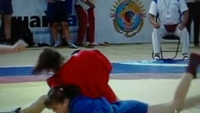 Sambo World Cup 2005, women: 64 kg, Ekaterina Golberg, Russia (in red)