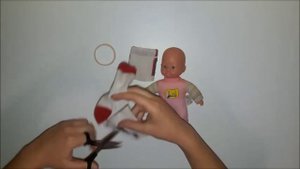 Делаем новое платье для пупсика из носка How to make a new suit for dolls