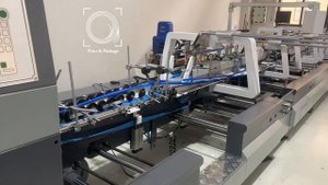 Фальцевально склеивающая линия с форсунками горячего клея