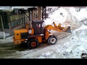 Расчистка от снега фронтальным погрузчиком В-138