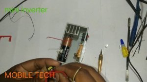 make a mini invertor using scrap mobile charger