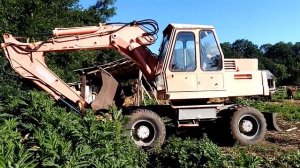 Atlas трактор экскаватор  с ковшом на колёсах