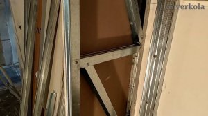 электро камин из гипсокартона с облицовкой из плитки, с проходной мебелью. Декоративный камин #7