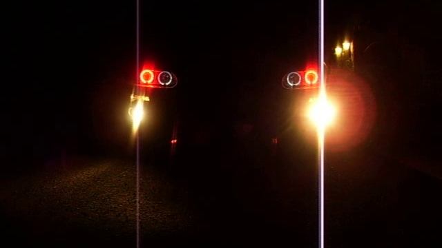 2000 Camaro SS with custom projector headlights featuring red halos смотреть онлайн