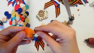 как аккуратно закрепить булавку на георгиевскую ленту