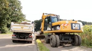 Аренда колесного экскаватора CAT 318D