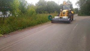 Щетка с бункером Kovaco 65240 на Komatsu WB93