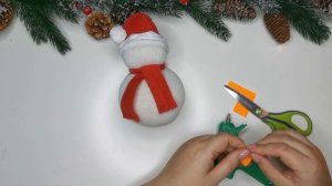 Идея как сделать снеговика из носка