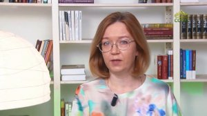 У книжной полки. Добрый портной