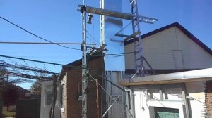 Леса из лестниц стремянок на обьекте Сайдинг