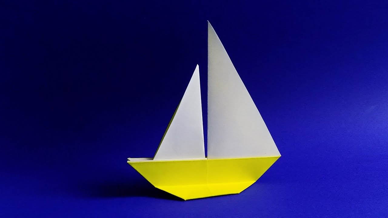 Покажи кораблик из бумаги. Оригами кораблик парусник. Оригами кораблик Джонка. Кораблик двухмачтовый оригами. Кораблик двухпарусный оригами из бумаги.