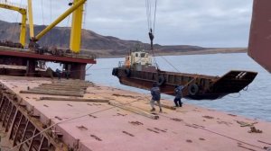 ООО Рейд погрузка баржи на судно