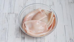 Кальмары фаршированные креветками, сыром и рисом