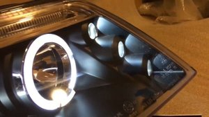 Фары передние VW Passat B5+ 00-05 черный c ангельскими глазками
